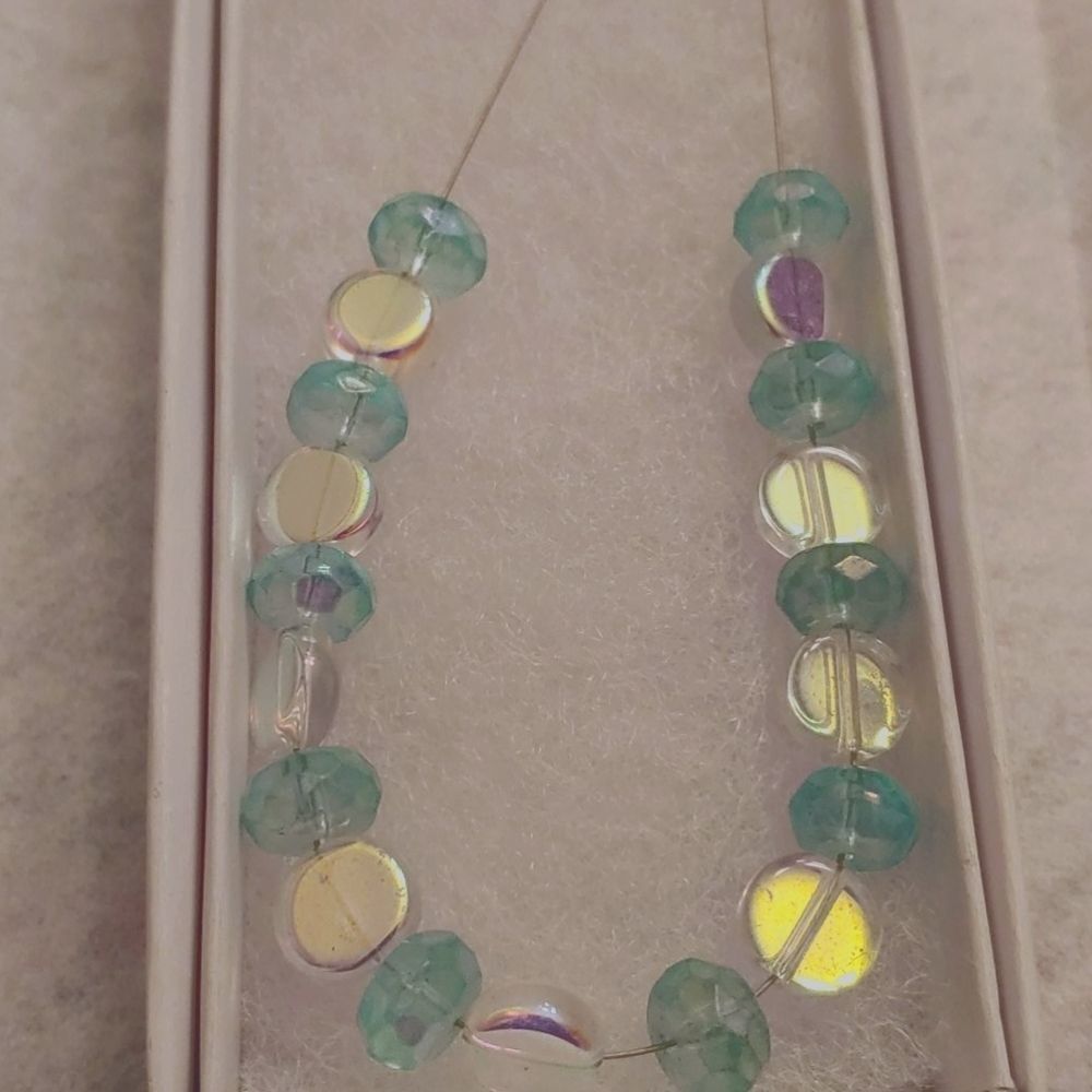 Handmade Necklace Turquoise round glass semi-transparent iridescent beads